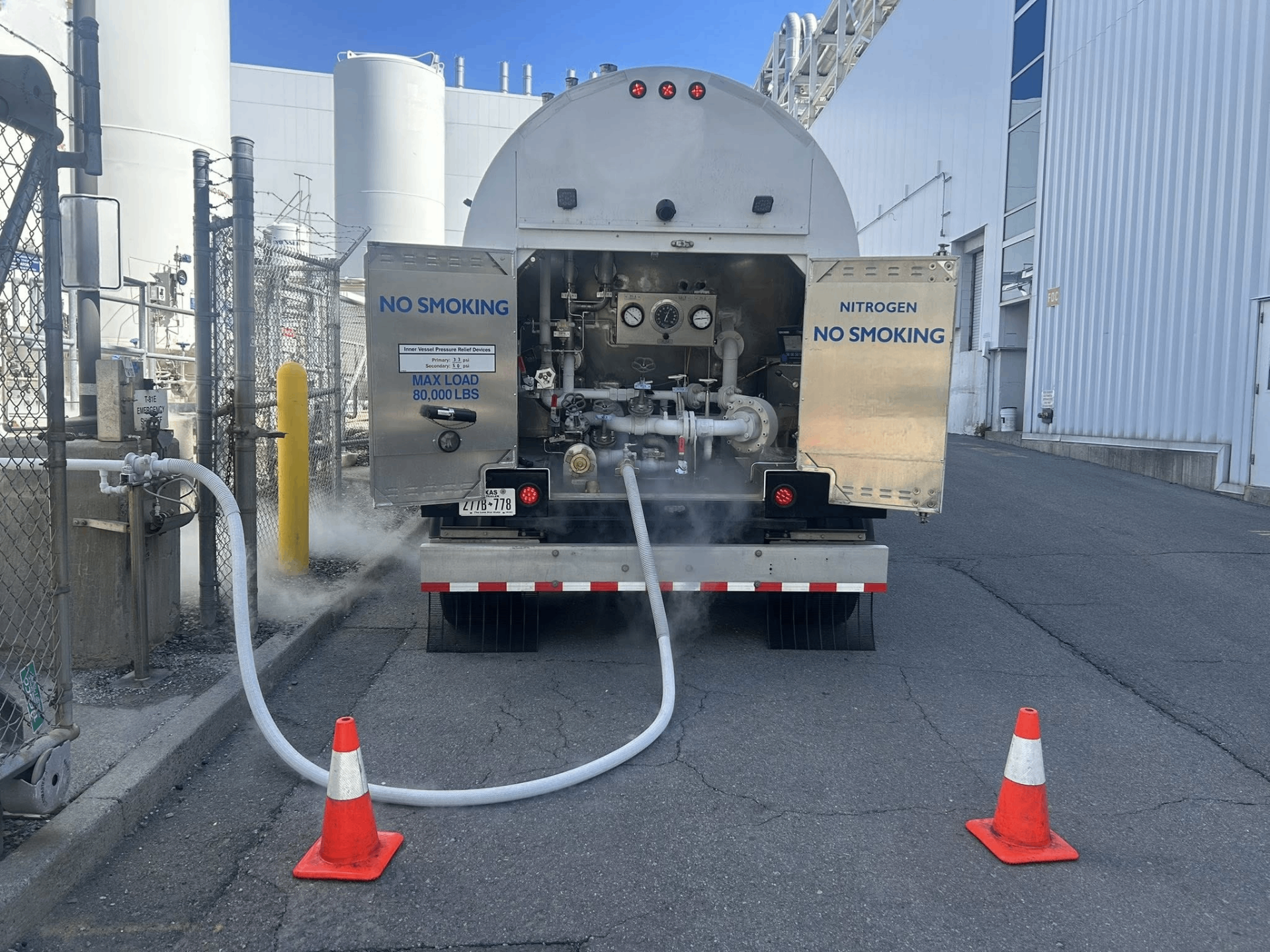 Cryogenic nitrogen tanker connected for offloading at an industrial facility